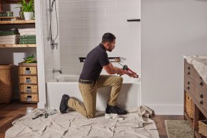 Contractor remodeling a tub/shower area