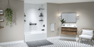 White bathtub/shower combination with black accessories. Patterned tile floor in beige bathroom